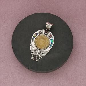 sterling silver abalone garnet carved sun pendant